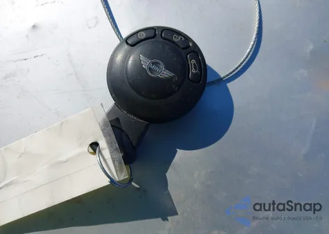 2009 Mini Cooper S z USA, uszkodzony, nr VIN WMWMF735X9TW87772